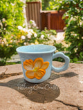 SOFT-HUED SCULPTED PETAL MUG