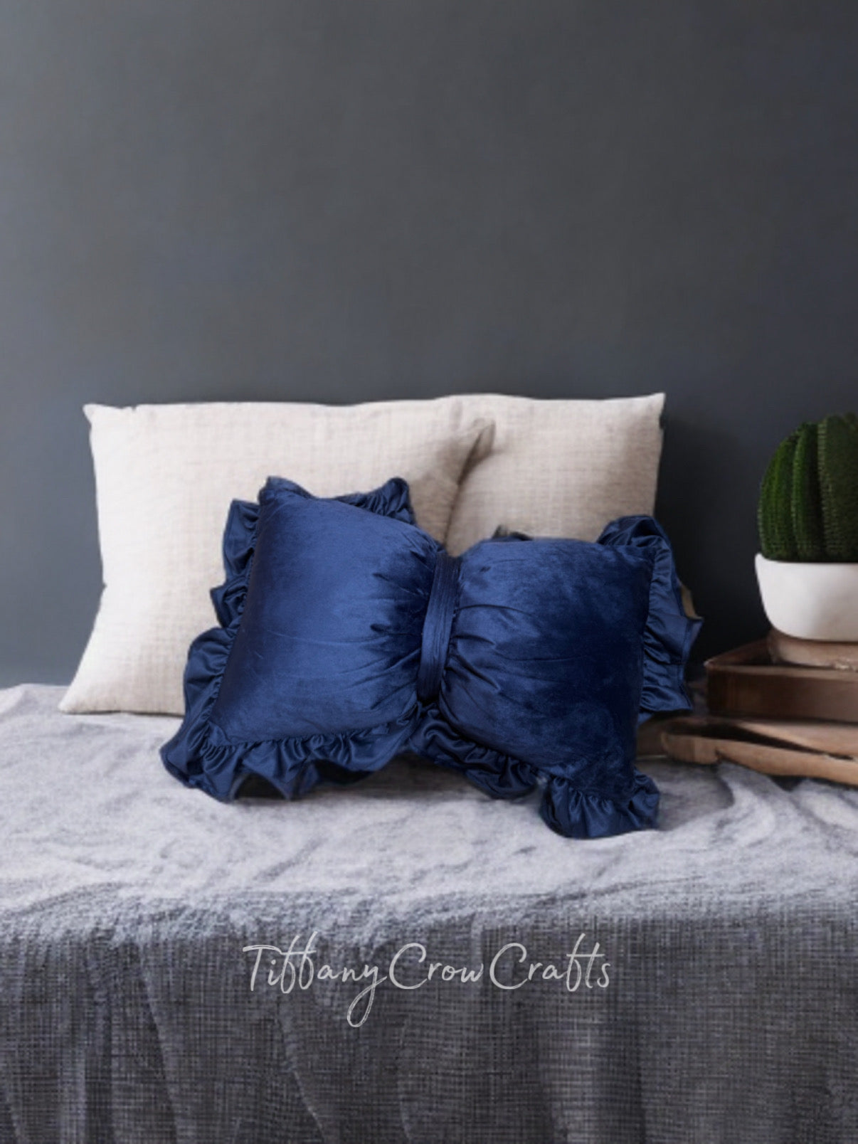 THE COQUETTE RUFFLED BOW PILLOW