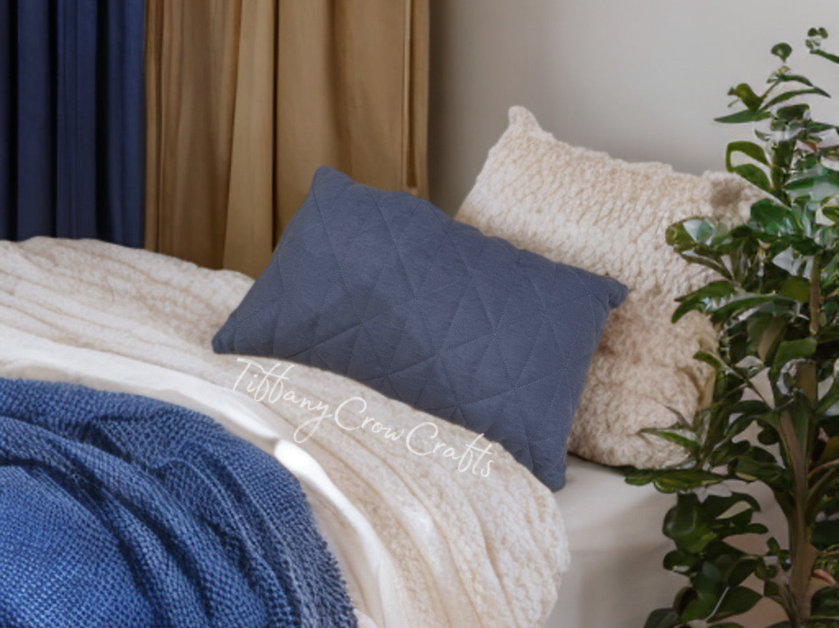 THE GEOMETRIC QUILT PILLOW